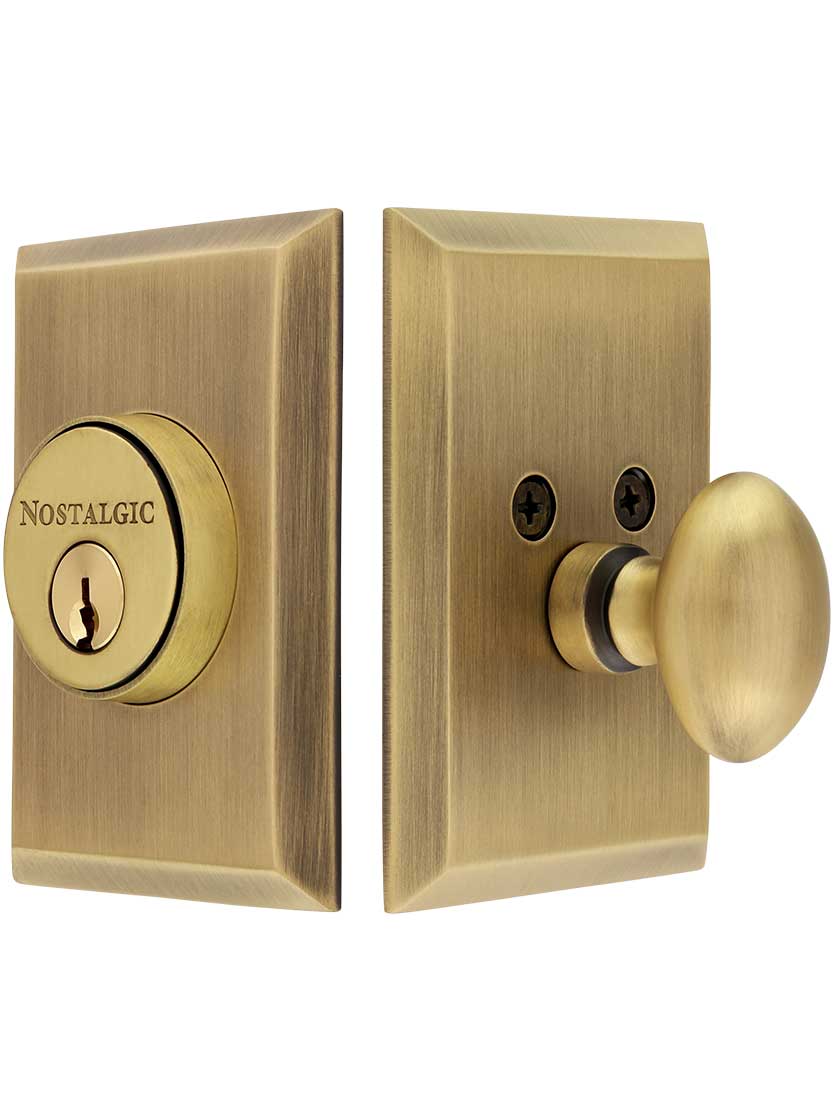 New York Style Single-Cylinder Deadbolt Keyed Differently in Antique Brass.